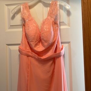 Worn as a bridesmaid dress one time. Could be worn as a prom dress/formal event